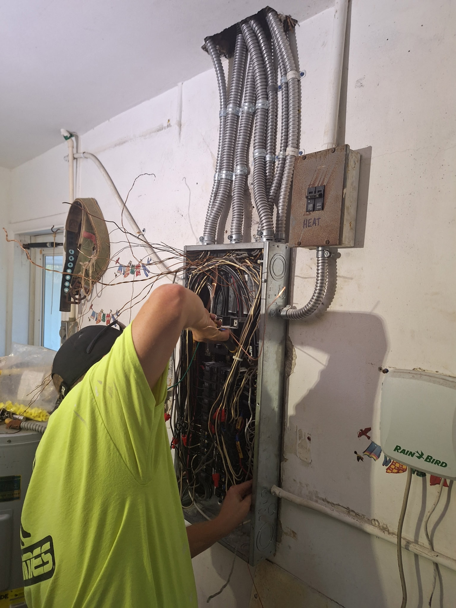 Technician working a residential panel