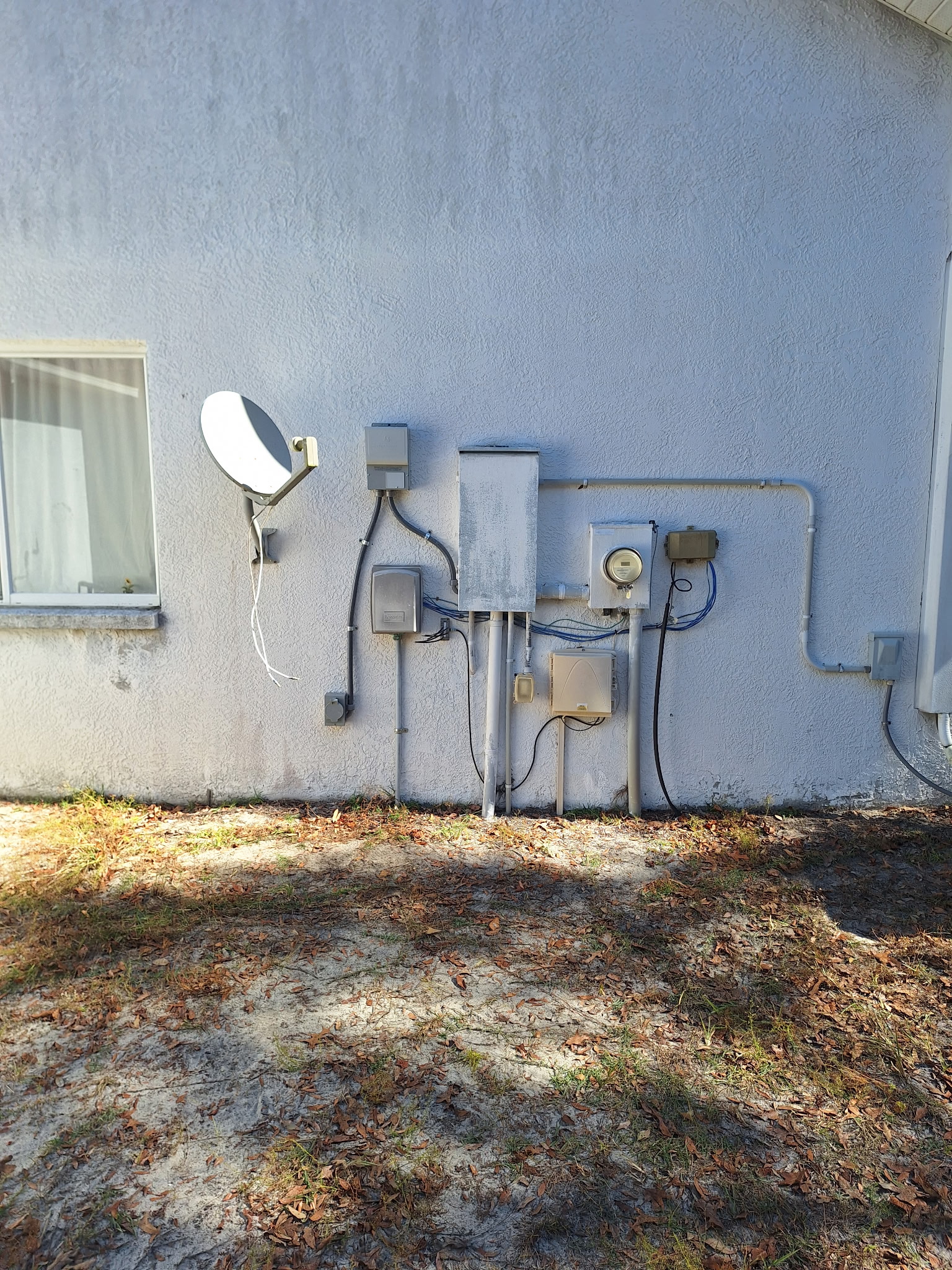 Exterior service panel and meter