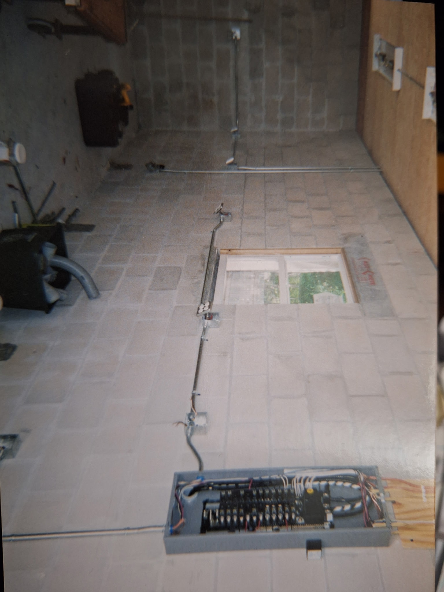 Conduit run on industrial floor
